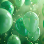 green festive background for birthday banner.Lots of balloons with shiny ribbons and confetti,empty space for text